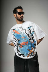Man wearing a white t-shirt with a colorful graphic design 